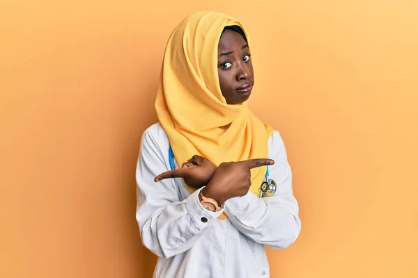 Beautiful African Young Woman Wearing Doctor Uniform Hijab Pointing Both — Stock Photo, Image