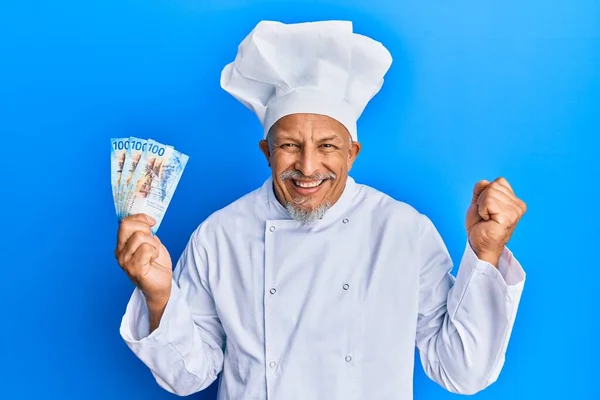 Middle Age Grey Haired Man Wearing Professional Cook Uniform Holding — Stock Photo, Image