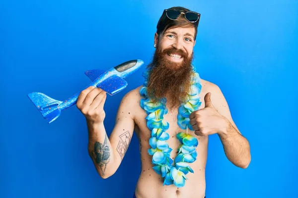 Redhead Man Long Beard Wearing Swimsuit Holding Plane Smiling Happy — Stock Photo, Image
