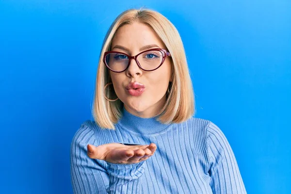 Young Blonde Woman Wearing Casual Clothes Glasses Looking Camera Blowing — Foto de Stock