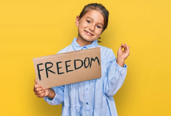 Little Beautiful Girl Holding Freedom Banner Smiling Happy Pointing Hand — Stock Photo, Image