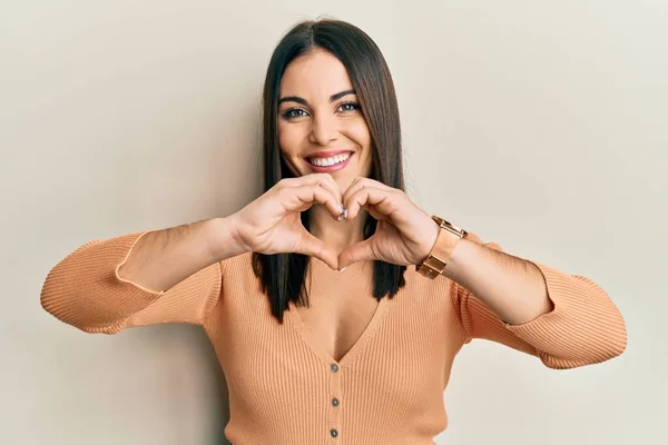 Young Brunette Woman Wearing Casual Clothes Smiling Love Doing Heart — Stock Photo, Image