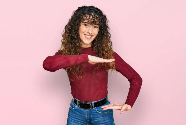 Young Hispanic Girl Wearing Casual Clothes Gesturing Hands Showing Big — Stock Photo, Image