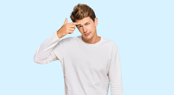 Handsome Caucasian Man Wearing Casual White Sweater Pointing Unhappy Pimple — Stock Photo, Image