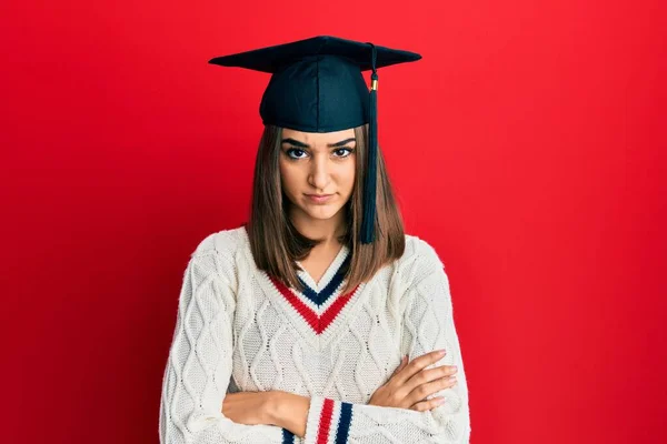 Young Brunette Girl Wearing Graduation Cap Skeptic Nervous Disapproving Expression — Photo