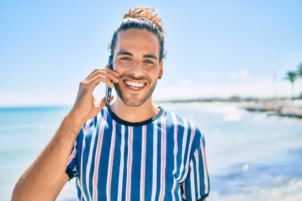 Young Hispanic Man Smiling Happy Talking Smartphone Beach — Stock Photo, Image