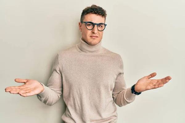 Hispanic Young Man Wearing Casual Turtleneck Sweater Clueless Confused Open — Photo