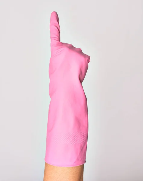 Mano Giovane Donna Caucasica Con Indosso Guanto Rosa Indicazione Con — Foto Stock