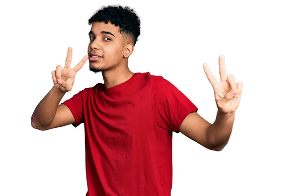 Young African American Man Wearing Casual Red Shirt Smiling Looking — Stock Photo, Image