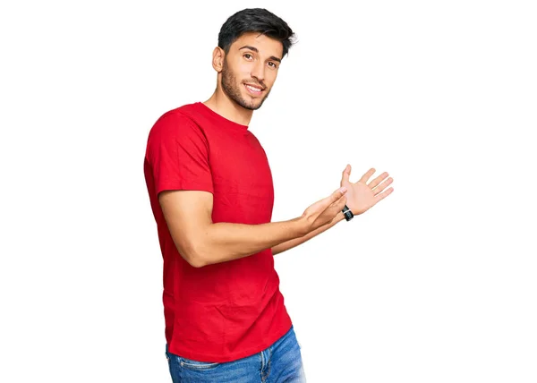 Young Handsome Man Wearing Casual Red Tshirt Inviting Enter Smiling — ストック写真