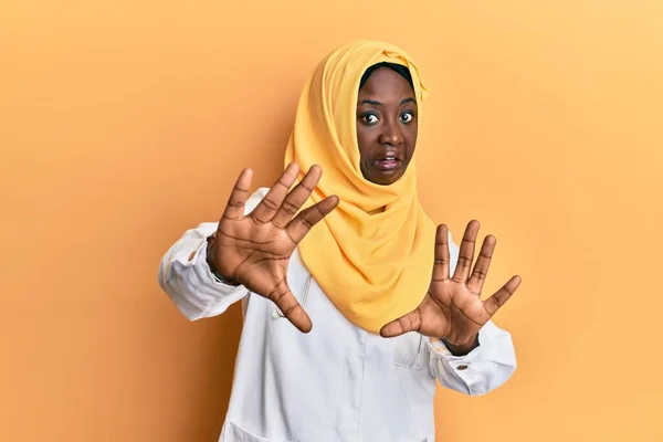 Beautiful African Young Woman Wearing Doctor Uniform Hijab Afraid Terrified — Stock Photo, Image