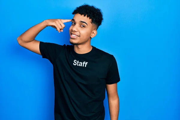 Young African American Man Wearing Staff Shirt Smiling Pointing Head — Foto de Stock