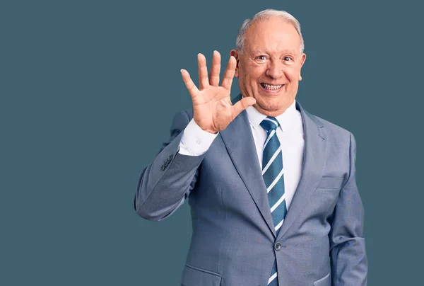 Senior Handsome Grey Haired Man Wearing Elegant Suit Showing Pointing — Stockfoto