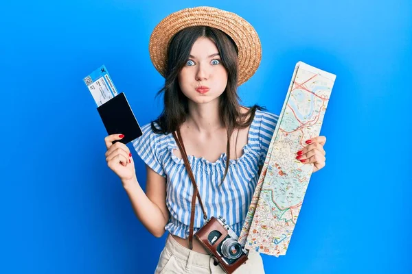 Young Beautiful Caucasian Girl Holding Passport City Map Puffing Cheeks — Fotografia de Stock