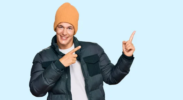 Handsome Caucasian Man Wearing Snow Wear Smiling Looking Camera Pointing — ストック写真