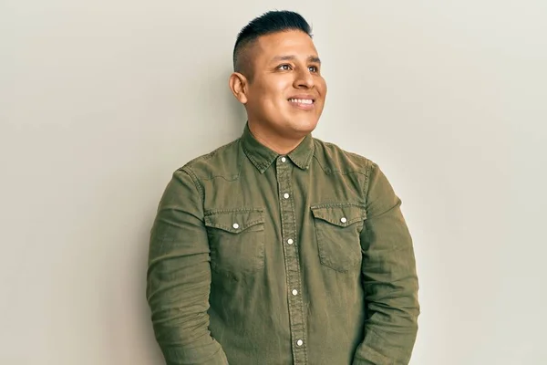 Young Latin Man Wearing Casual Clothes Looking Away Side Smile — Stock Photo, Image