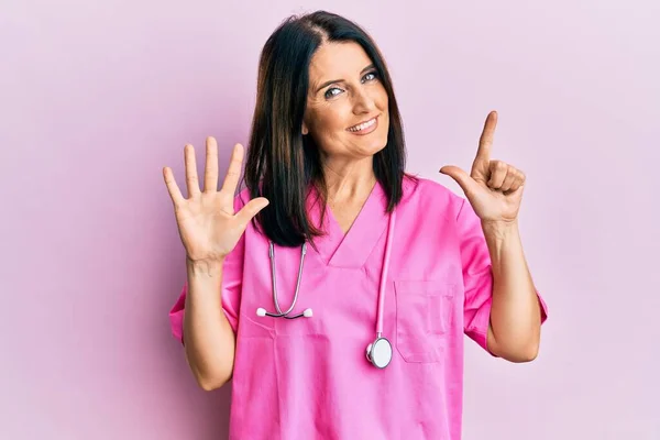 Middle Age Brunette Woman Wearing Doctor Uniform Stethoscope Showing Pointing — Fotografia de Stock