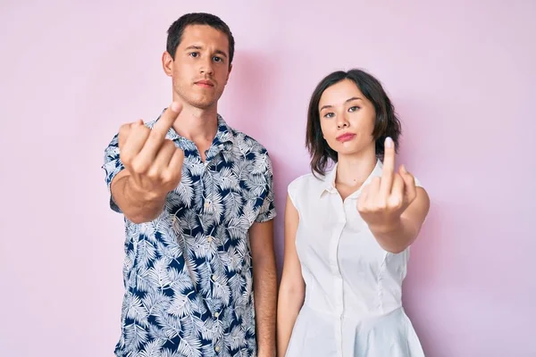 Beautiful Couple Wearing Casual Clothes Showing Middle Finger Impolite Rude — Fotografia de Stock