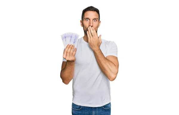 Handsome Man Beard Holding Swedish Krona Banknotes Covering Mouth Hand — Stok fotoğraf