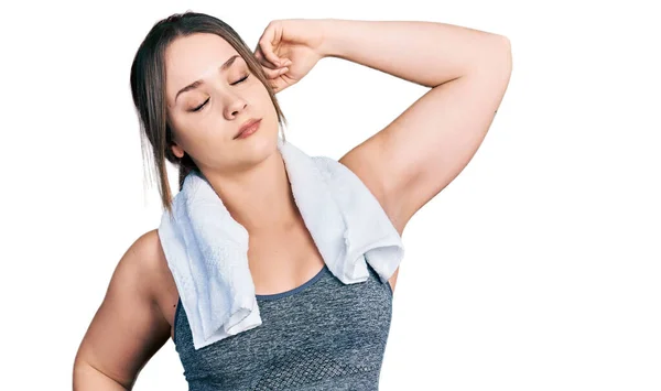 Young Hispanic Girl Wearing Sportswear Towel Stretching Back Tired Relaxed — Stock Photo, Image