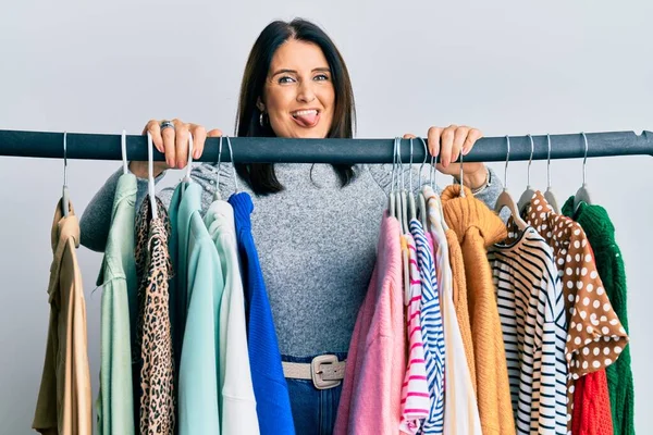 Middle Age Brunette Woman Working Professional Personal Shopper Sticking Tongue — Stok fotoğraf