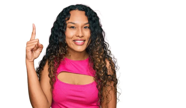 Young Hispanic Woman Curly Hair Wearing Pink Top Pointing Finger — Foto de Stock
