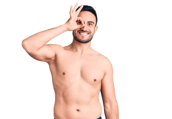 Joven Hombre Guapo Con Traje Baño Sonriendo Feliz Haciendo Signo —  Fotos de Stock