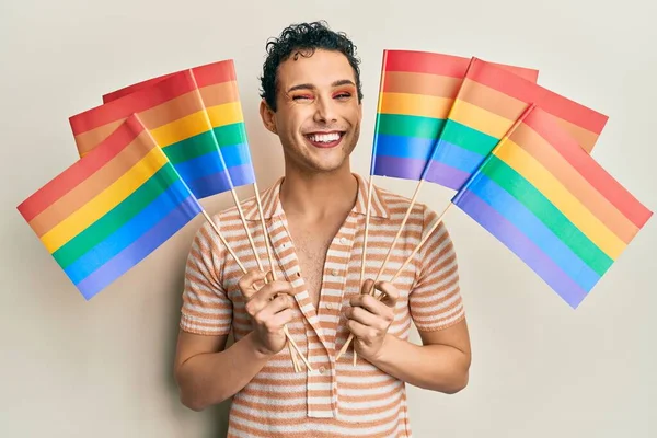 Handsome Man Wearing Make Holding Rainbow Lgbtq Flags Winking Looking —  Fotos de Stock