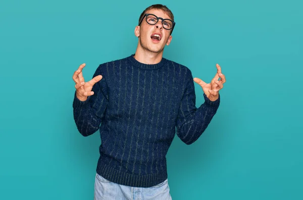 Young Blond Man Wearing Casual Clothes Glasses Crazy Mad Shouting — Stockfoto