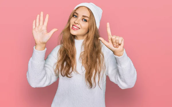 Young Caucasian Girl Wearing Wool Sweater Winter Cap Showing Pointing — Stock Photo, Image