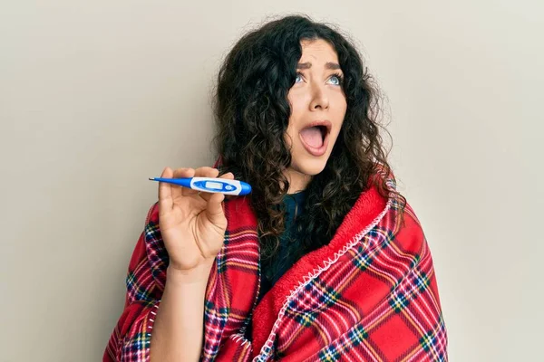 Young Brunette Woman Curly Hair Wrapped Blanket Holding Thermometer Angry — Stock fotografie