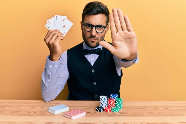 Handsome Hispanic Croupier Man Sitting Table Poker Chips Cards Open — Stok fotoğraf