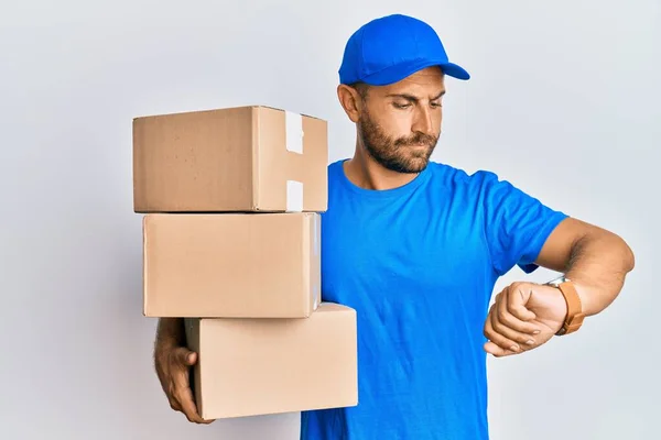Handsome Man Beard Wearing Courier Uniform Holding Delivery Packages Checking — Stok fotoğraf