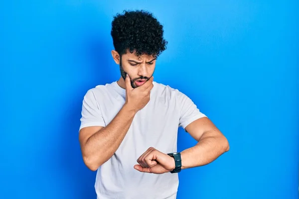 Young Arab Man Beard Wearing Casual White Shirt Looking Watch — Stock Fotó