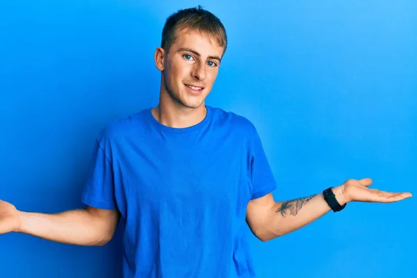 Young Caucasian Man Wearing Casual Blue Shirt Smiling Showing Both — Stockfoto