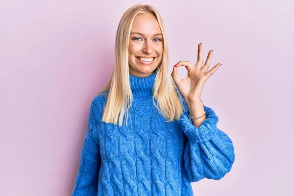 Young Blonde Girl Wearing Wool Winter Sweater Smiling Positive Doing — Fotografia de Stock