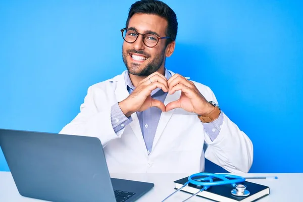 Young Hispanic Man Wearing Doctor Uniform Working Clinic Smiling Love — Stock Photo, Image