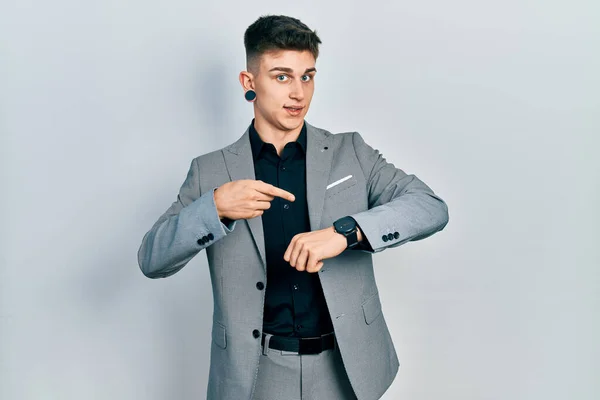 Young Caucasian Boy Ears Dilation Wearing Business Jacket Hurry Pointing — Stock Photo, Image