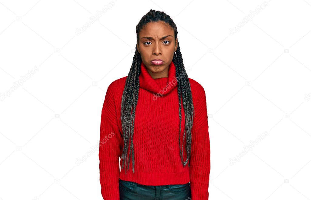 African american woman wearing casual winter sweater depressed and worry for distress, crying angry and afraid. sad expression. 