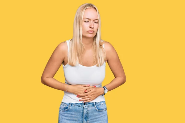 Young Blonde Girl Wearing Casual Style Sleeveless Shirt Hand Stomach — Stock Photo, Image