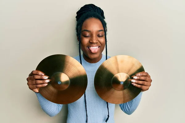 African American Woman Braided Hair Holding Golden Cymbal Plates Sticking —  Fotos de Stock