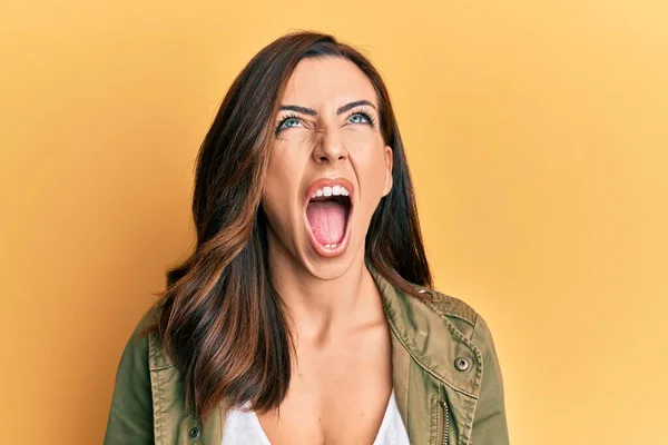 Young Brunette Woman Wearing Casual Clothes Yellow Background Angry Mad — Stock fotografie