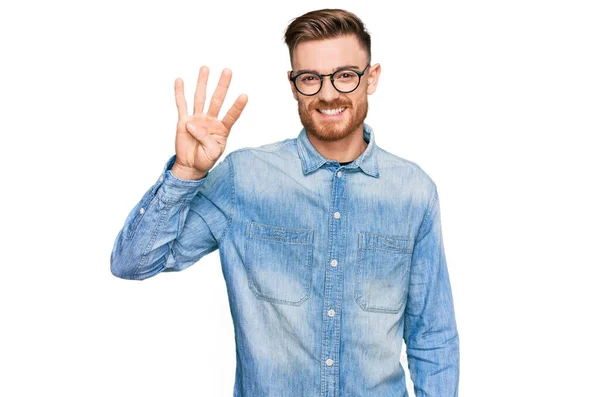 Young Redhead Man Wearing Casual Denim Shirt Showing Pointing Fingers — Stock Photo, Image