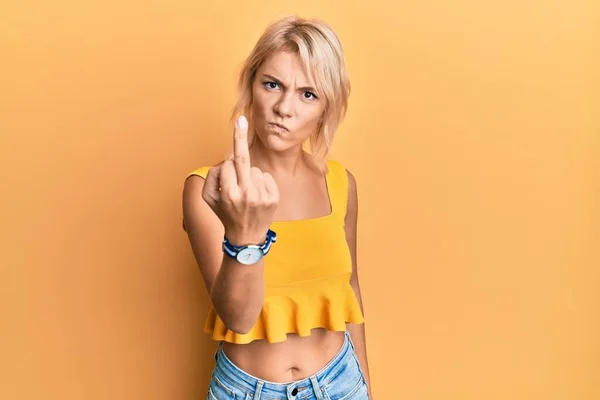 Young Blonde Girl Wearing Casual Clothes Showing Middle Finger Impolite —  Fotos de Stock