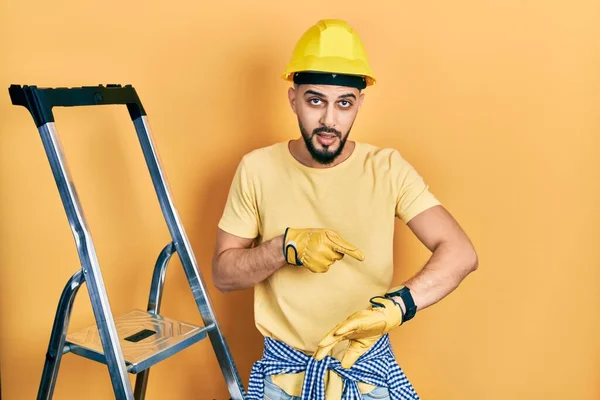 Handsome Man Beard Construction Stairs Wearing Hardhat Hurry Pointing Watch — 스톡 사진