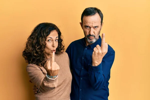 Middle Age Hispanic Couple Wearing Casual Clothes Showing Middle Finger — Foto de Stock