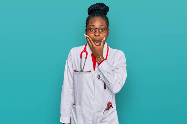 Young African American Woman Wearing Doctor Uniform Stethoscope Looking Fascinated — Stock Photo, Image