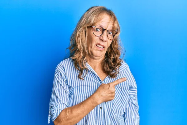 Middle Age Blonde Woman Wearing Casual Clothes Glasses Pointing Aside — Stock Photo, Image