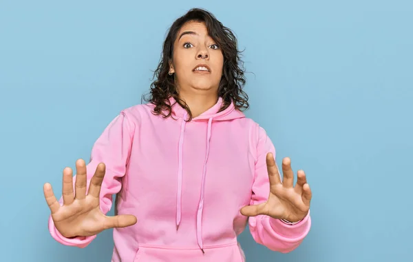 Young Hispanic Woman Wearing Casual Sweatshirt Afraid Terrified Fear Expression — Stock Photo, Image