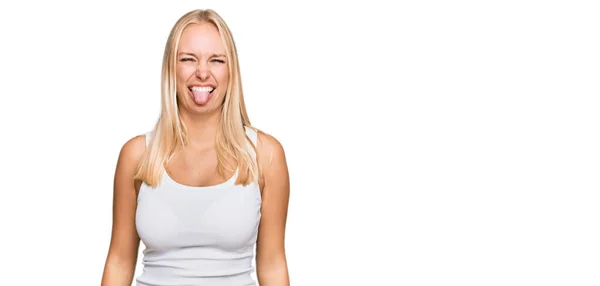 Young Blonde Girl Wearing Casual Style Sleeveless Shirt Sticking Tongue — Stock Photo, Image